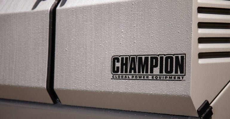 Exterior of a Champion home generator with moisture on the surface.
