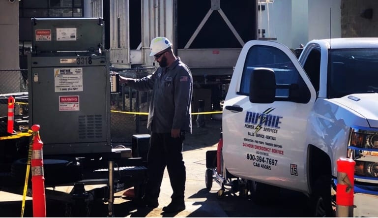 Duthie Power Technician working with a load bank.