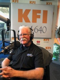 Duthie Power Sales Engineer Pete Thornton in a radio studio at KFI AM 640 being interviewed by Dean Sharp.